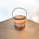 Small ceramic bucket with a beach sunset scene and wire handle