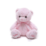 Pink teddy bear with a ribbon bow sitting on a white background