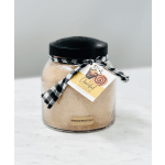Jar of snickerdoodle mix with a black lid and ribbon tag