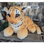 Plush tiger toy lying on a table