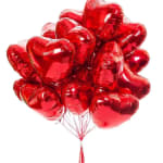 Cluster of red heart-shaped balloons tied together