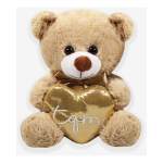 Plush teddy bear holding a gold heart