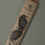 A boxed incense stick package with raven illustrations