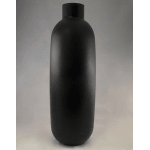 Tall matte black bottle-shaped vase on a plain background