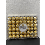 Box of Ferrero Rocher chocolates in gold wrappers