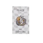Enamel pin with a peace sign and flowers on a backing card