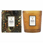 Two Voluspa Baltic Amber candles in decorative glass containers
