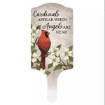 Decorative sign with a red cardinal and white flowers