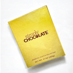 Gold box of assorted chocolates on a white background