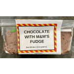 Rectangular tub of chocolate fudge with M&M's candies in a clear plastic container