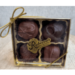 Box of four assorted chocolates with a gold ribbon
