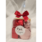 Gift bag with assorted chocolates and a red ribbon bow