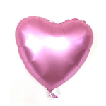 Pink heart-shaped foil balloon on a white background
