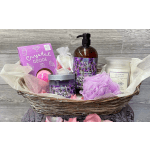 Spa gift basket with lavender bath products and a crystal geode bath bomb