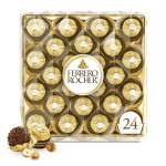 Box of Ferrero Rocher chocolates with two loose chocolates in front