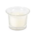 White candle in a clear glass votive holder