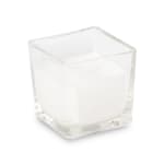 Clear square glass candle holder with a white candle inside