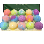 Box of colorful bath bombs arranged in rows