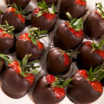 Chocolate-covered strawberries arranged in a tray