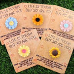 Flower-shaped pocket hug cards with uplifting messages