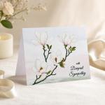 Sympathy card with white magnolia blossoms and the words "Deepest Sympathy"