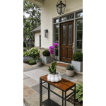 Potted purple orchid on a bench outside a front door