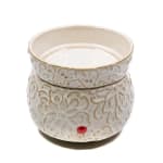 Cream ceramic candle warmer with embossed floral scrollwork