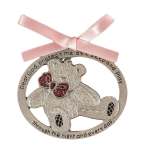 Teddy bear ornament with a pink ribbon bow and engraved text