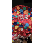 Red birthday balloon with colorful polka dots and "Feliz Cumpleaños" text