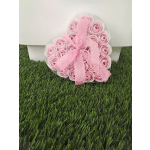 Heart-shaped box of pink foam roses tied with a pink ribbon