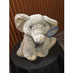 Gray plush elephant toy with a hanging tag