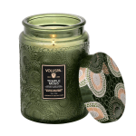 Green patterned candle jar with a matching lid