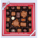 Box of assorted chocolates in a red gift box with a silver ribbon