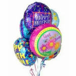 Cluster of colorful anniversary and birthday balloons
