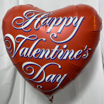 Red heart-shaped balloon with "Happy Valentine's Day" text