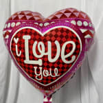 Heart-shaped foil balloon with "I Love You" text