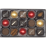 Box of assorted chocolates in paper cups