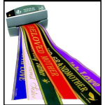 Ribbon award sashes hanging from a box