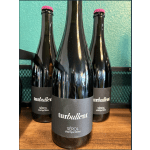 Three dark wine bottles with black labels on a wooden surface