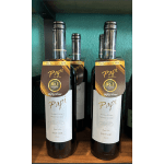 Two wine bottles with hanging tags on a shelf