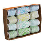 Boxed set of individually wrapped Bon Bon soaps in white paper with blue, green, and yellow text, arranged in rows.