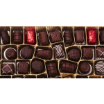 Assorted chocolate truffles in gold paper cups