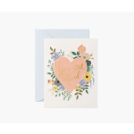 Greeting card with a pink heart and floral wreath reading "You are Loved"