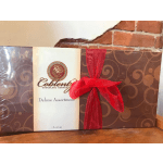 Box of assorted chocolates tied with a red ribbon