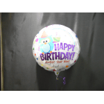 Round birthday balloon with an owl and "Happy Birthday" text