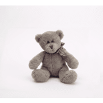 Gray teddy bear with a checkered ribbon sitting on a white background