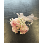 Small pink rose bouquet with baby's breath and a sheer ribbon