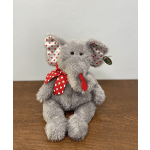 Gray plush elephant with red heart-patterned ribbon