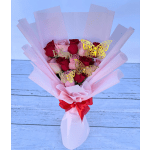 Pink and red rose bouquet with butterfly picks and a red ribbon