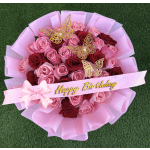 Pink and red rose bouquet with a Happy Birthday ribbon